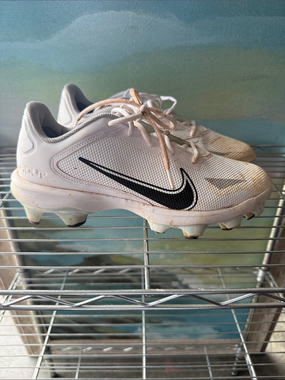 Nike MEN’S White Baseball Cleats with Black Swoosh